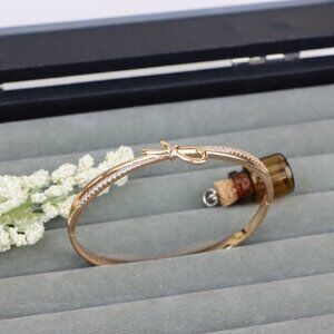 Rose Gold Bow Knot Bangle with Sparkling CZ Accents, XPBL0427